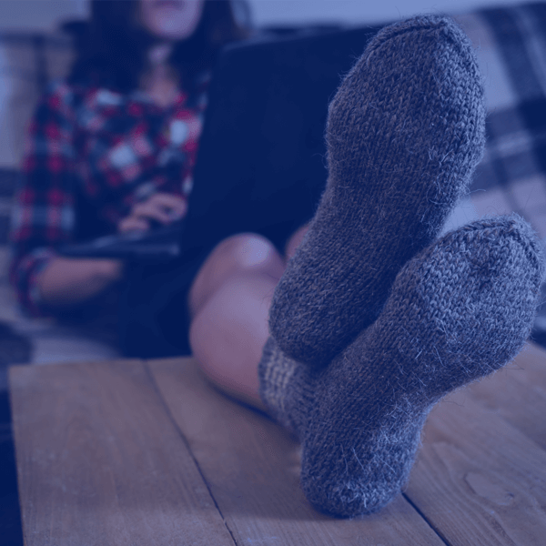 Girl with laptop on couch